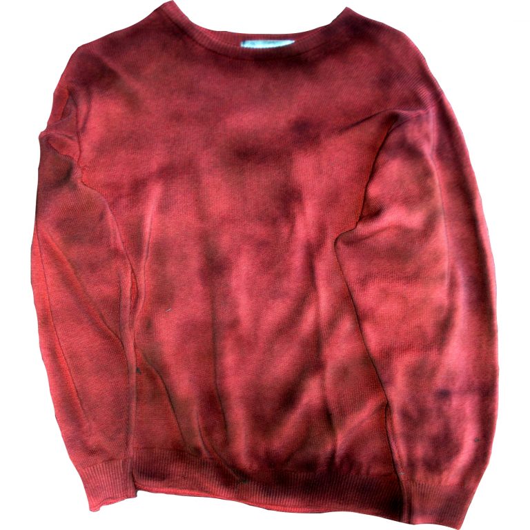 Jumper after several coats ageing spray have been applied