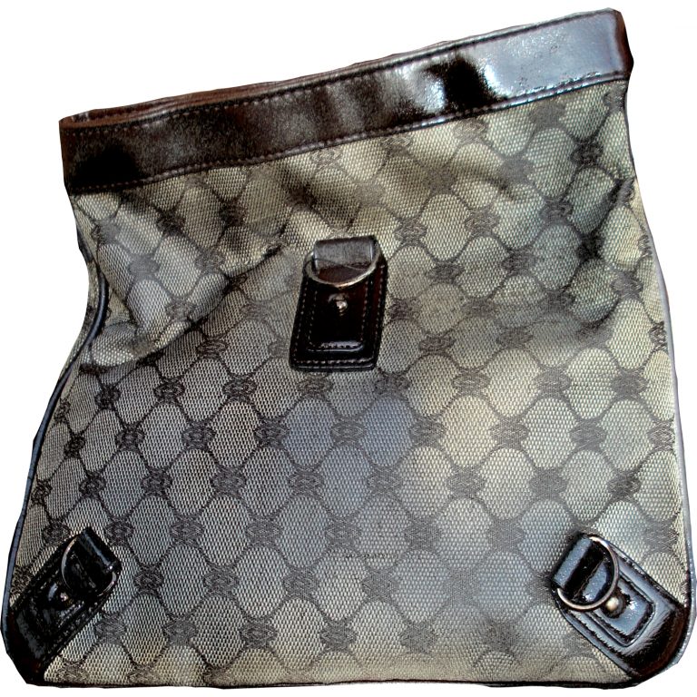 Handbag after ageing spray has been applied