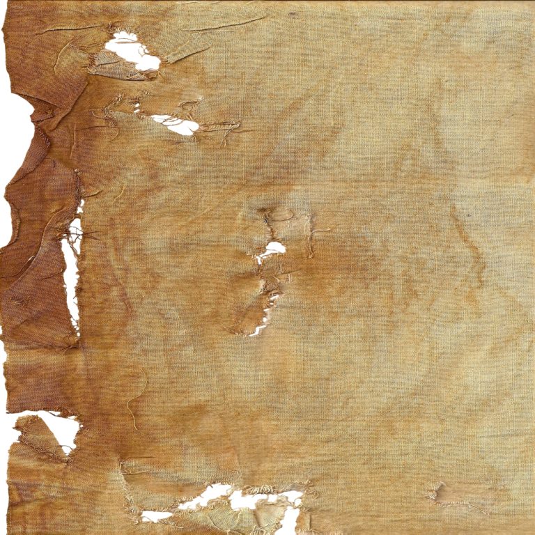Fabric sprayed with rust ageing spray